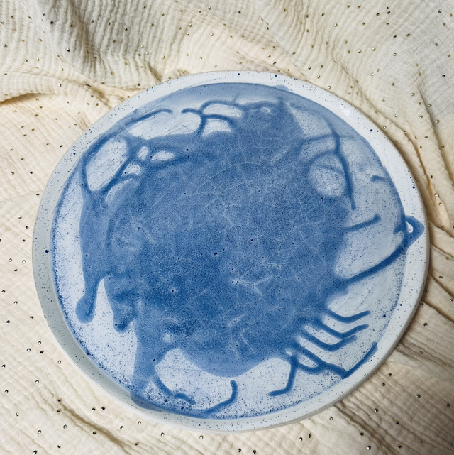 Grand plat rond tâche bleue
