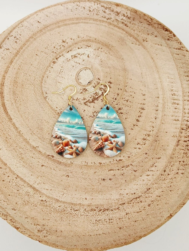 Boucle d&#039;oreilles larme sublimée coquillages