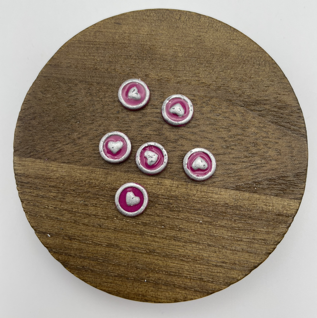 Pink and silver heart studs