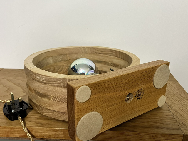 Modern round living room lamp with Edison bulb.