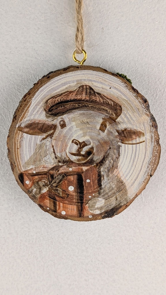 Sheep with gift, flat cap - Log slice