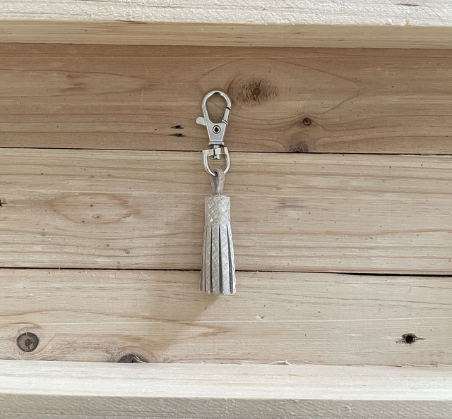 Pompon beige avec motif