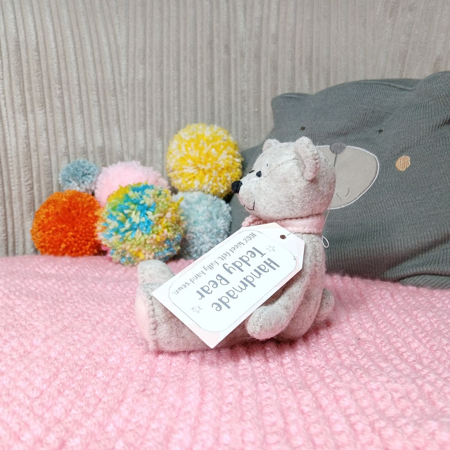 No name* traditional beige bear. Soft pink bow tie. Small size, handmade teddy bear. UKCA. Tray base. Standard Wool Felt. Beige. Cream. Blush. Pastel.
