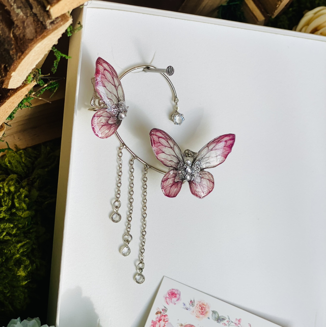 Papillon argent tour d’oreille