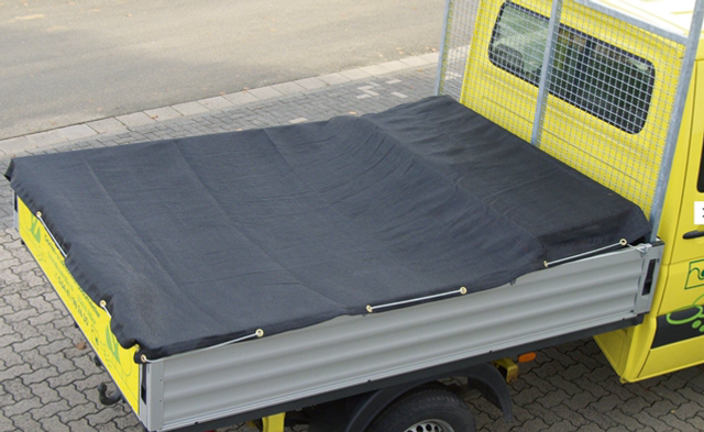 Air Permeable Cargo Covers for Securing Loads 