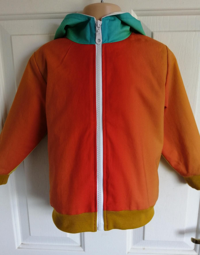 Jacket - 2 yrs (92 cm).   Dark orange/mustard