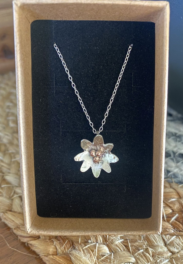 Lilly in hammered sterling silver with copper detailing