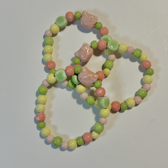 Handmade elastic ceramic beaded bracelet pastel yellow green pink design 