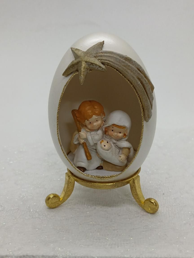 Nativity in a white Goose egg with star