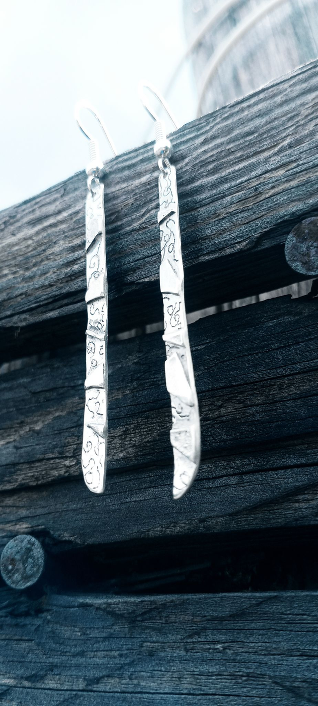 Boucle d'oreille S.K.I
