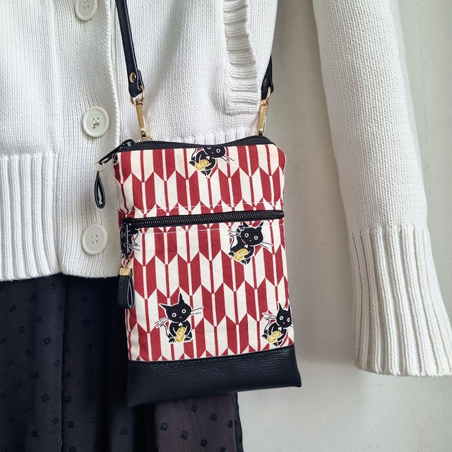 Mini-sac pour téléphone "Maneki" blanc noir & simili cuir noir