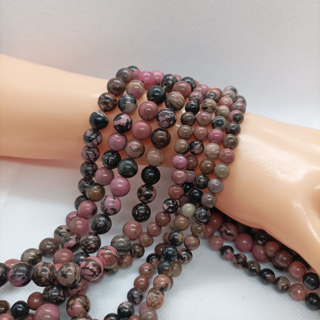 Rhodonite Marbrée perles rondes et polies - Fil complet