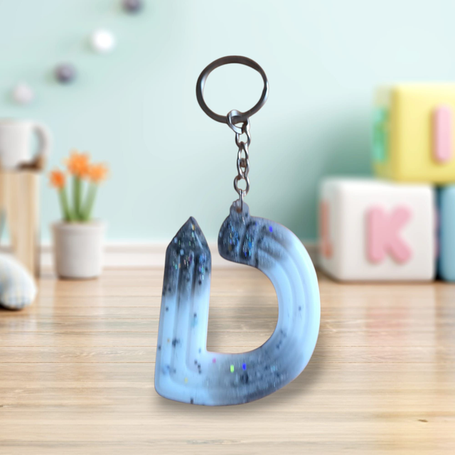 Porte-clés initiale crayons