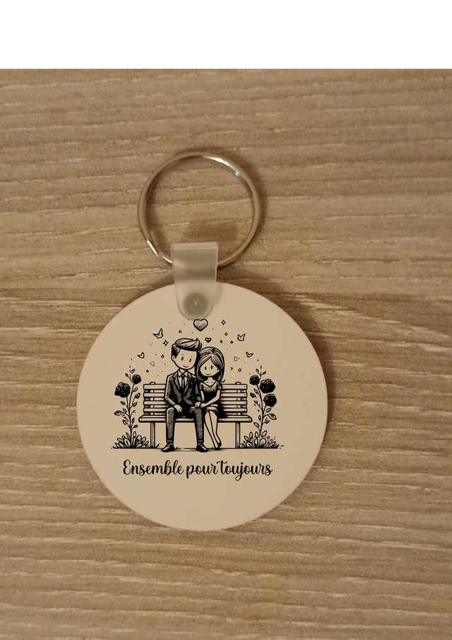 Porte clé couple sur un banc