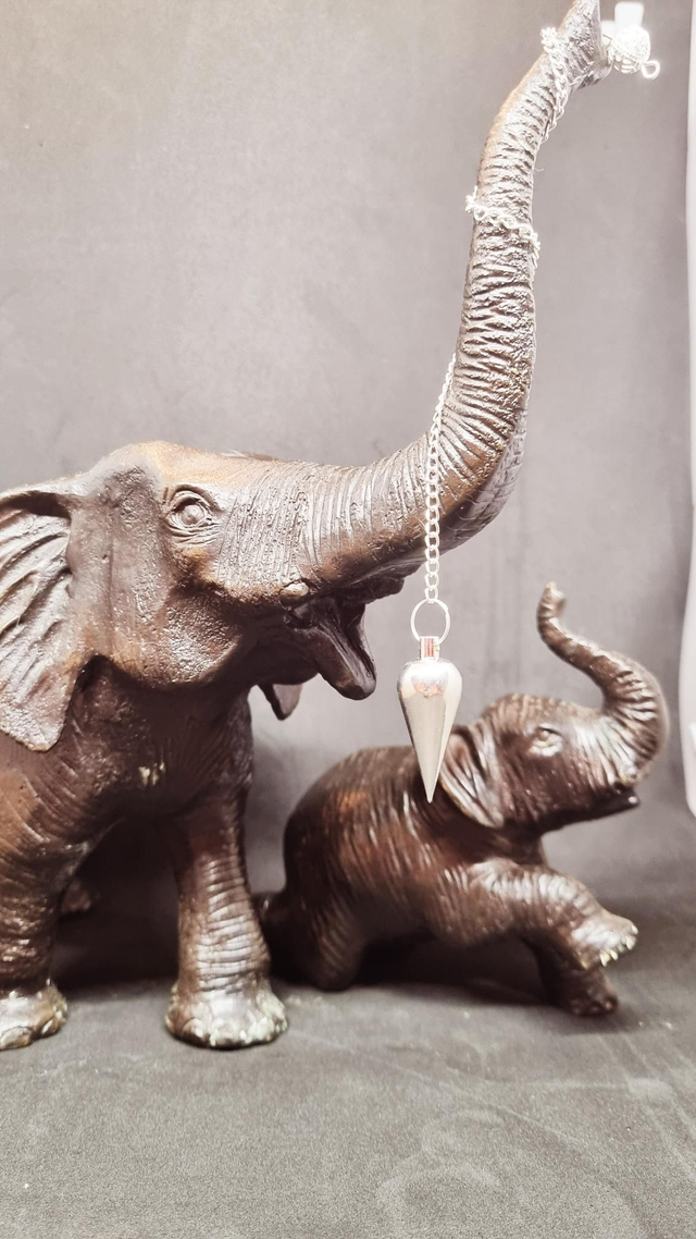 Pendule conique en métal argenté