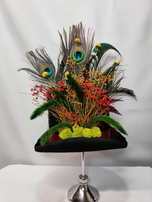 Le Haut de Forme Rouge