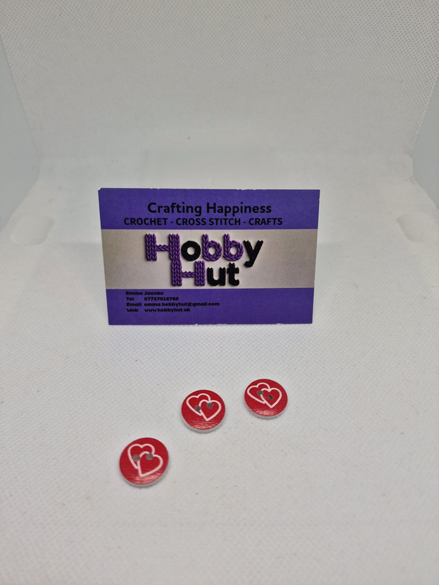 Red Buttons With Two Outlined Hearts