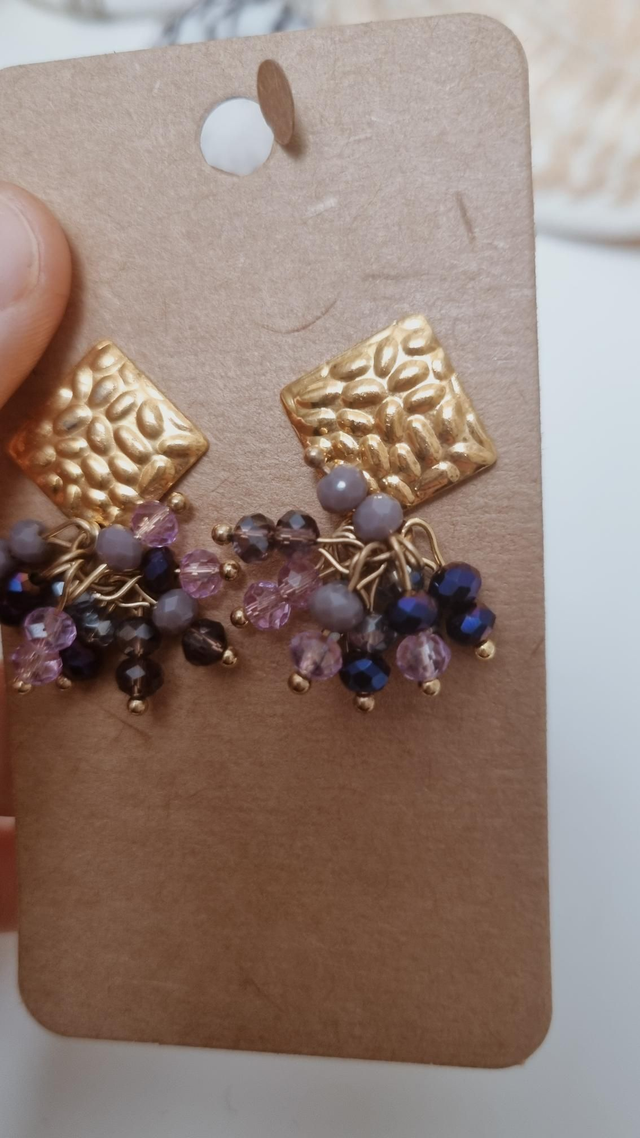 Boucles d'oreilles đ
