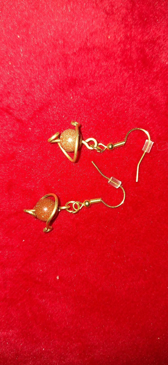 Planetary lovers earrings in gold with goldstone, two earrings
