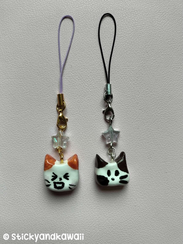 Bijou de téléphone chat et étoile 