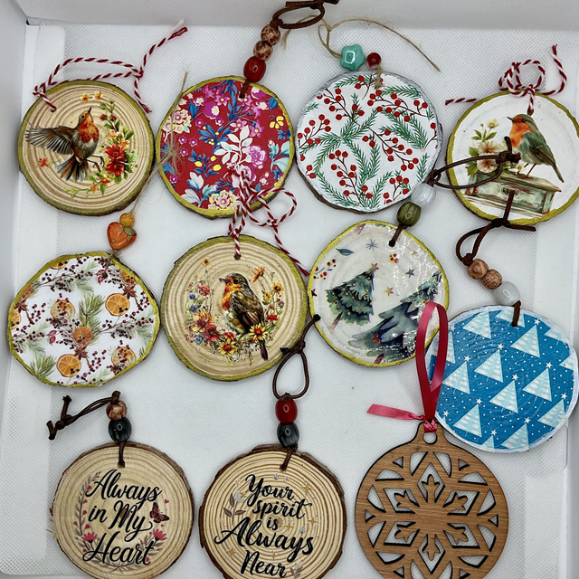 Handmade Christmas decorations. Hanging wooden decorations.