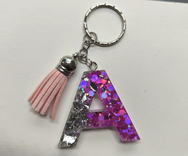 Porte clés initiale "A" rose pailletté et feuilles argentées 