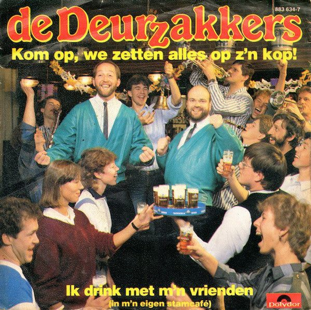 Deurzakkers - Kom Op We Zetten Alles Op Z&#039;n Kop