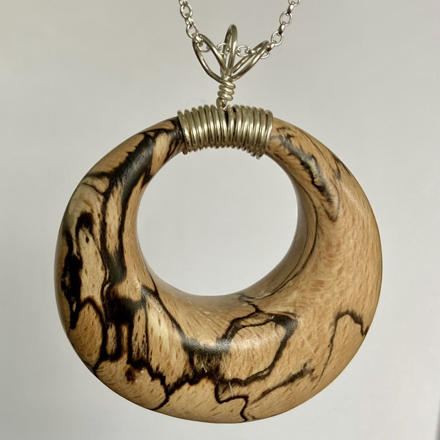 Beech - Handcrafted spalted beech circle pendant with a sterling silver bail and 20” sterling silver chain [003-0004]