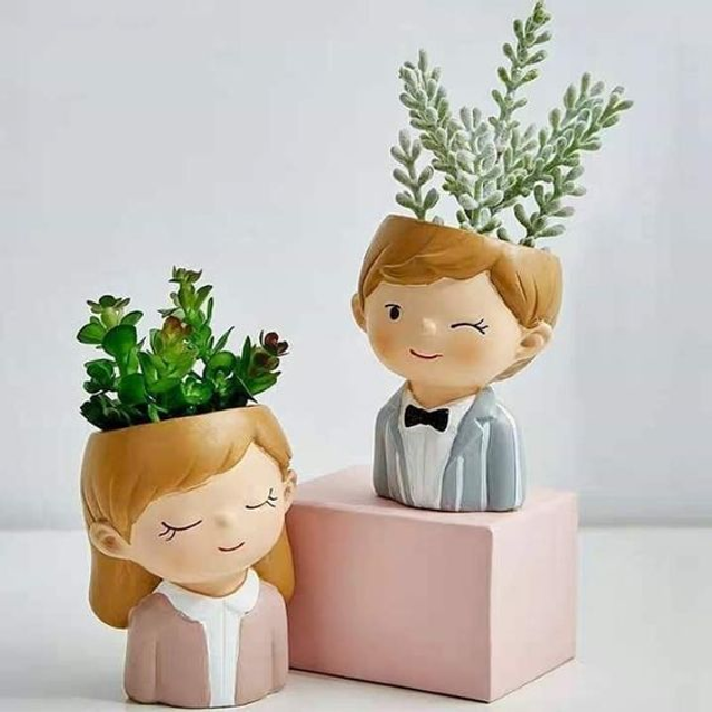 2 jardinière mignonne couple fille et garçon