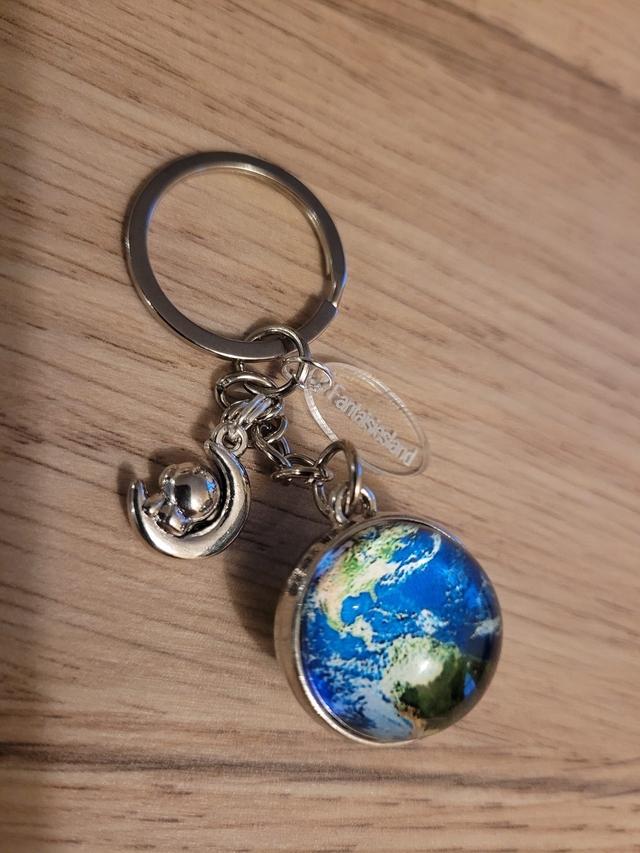 Porte-clés argenté - Vue de l'espace