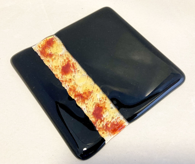 Black and gold coaster 