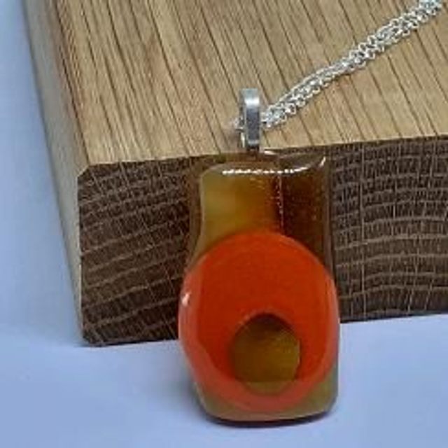 Orange circle pendant