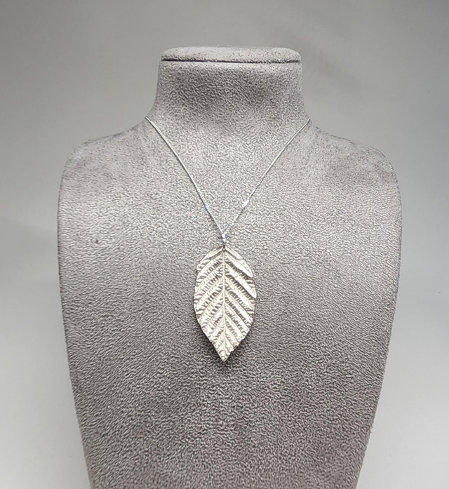 Hornbeam leaf pendant on silver necklace