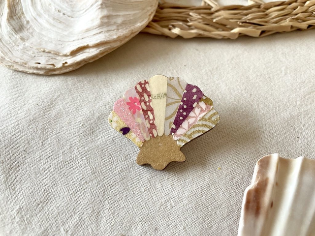Broche coquillage tons rose et mauve