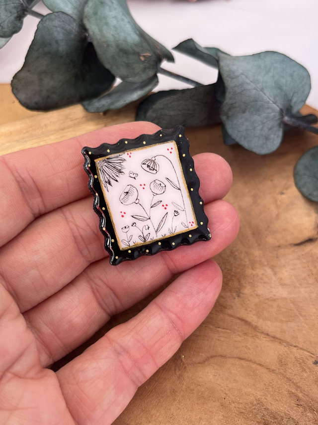 Broche timbre fleurs