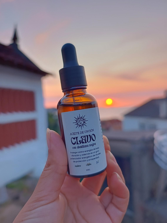 Aceite Unción Clavo con obsidiana negra 