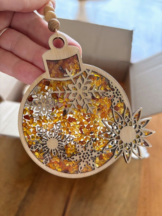 Boule plate en bois incrustée d'Ambre