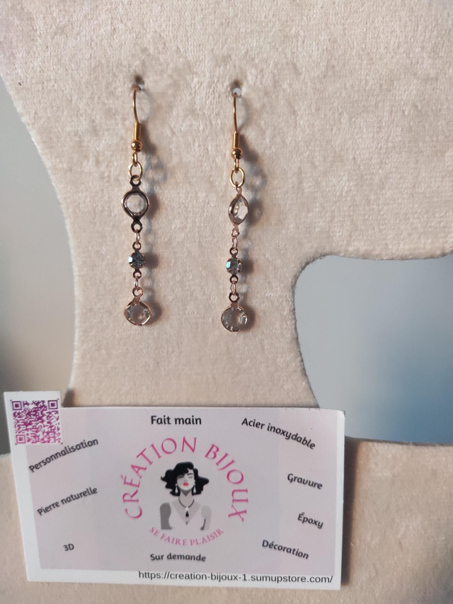 Boucle d'oreille pendante strass transparent