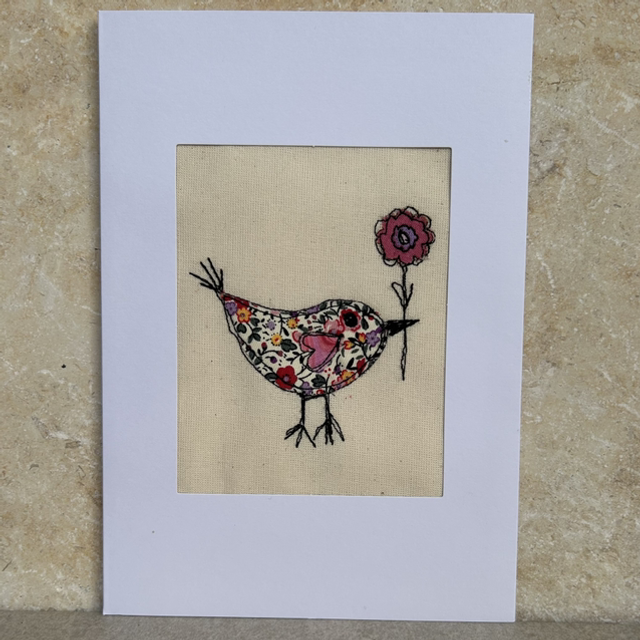 Free motion Embroidery and appliqué bird with flower 