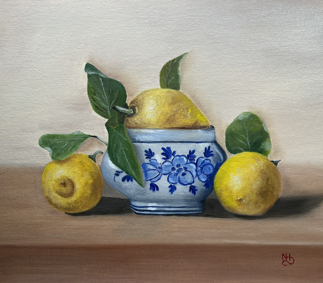 Lemons with a blue pot 