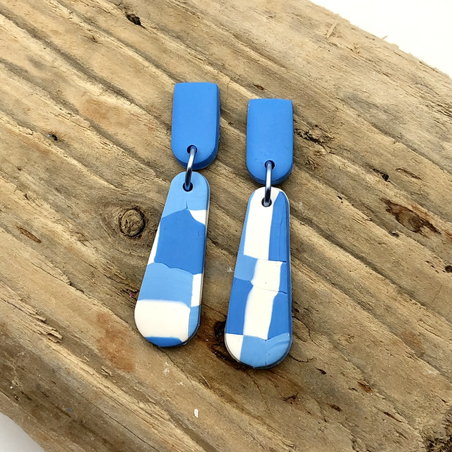 Abstract blue statement drops