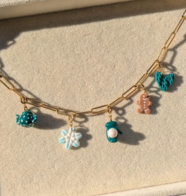 Charm moufle avec boule de neige