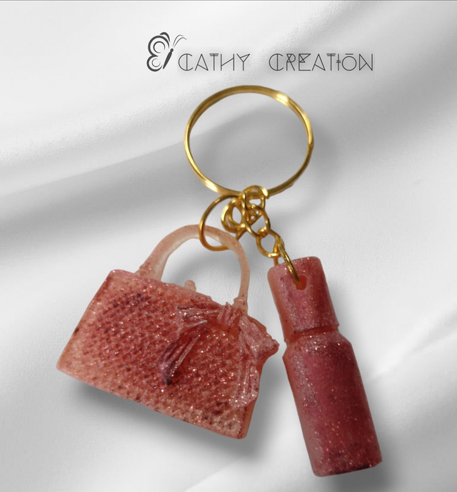 Porte clés rose pailleté 