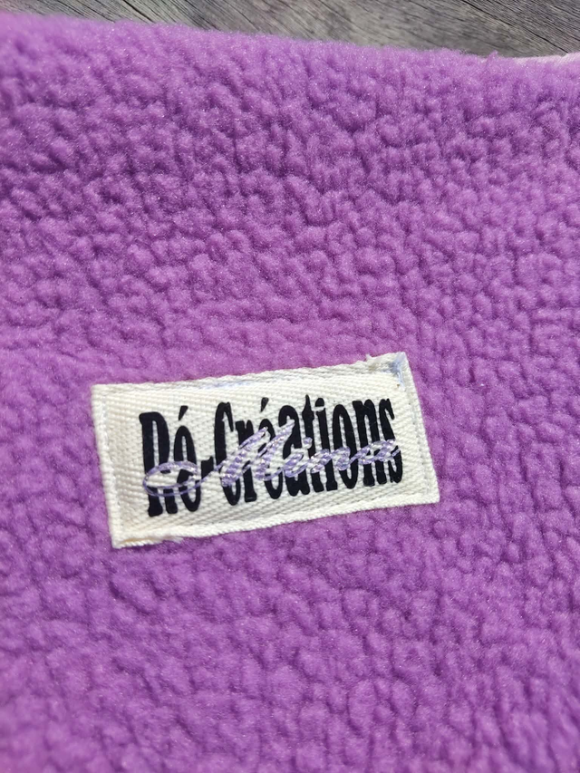 Housse de livre artisanale en tissu boucle mauve et coton fleuri