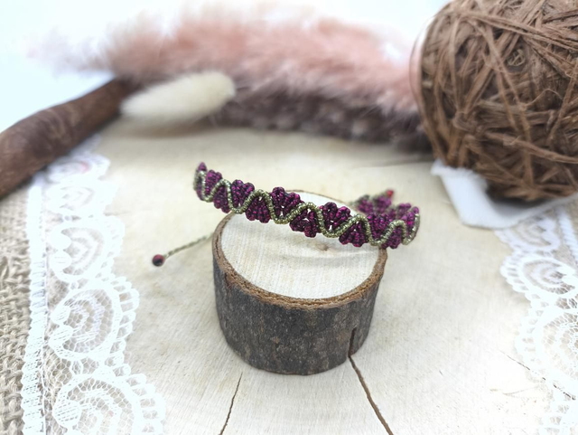 Bracelet tissage coeurs framboise métal/doré