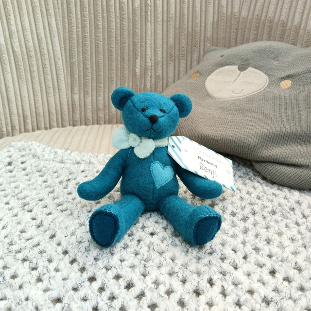 Benji. Small size, handmade teddy bear. UKCA. Tray base packaging. Limited Edition Wool Felt. Dark teal. Blue.