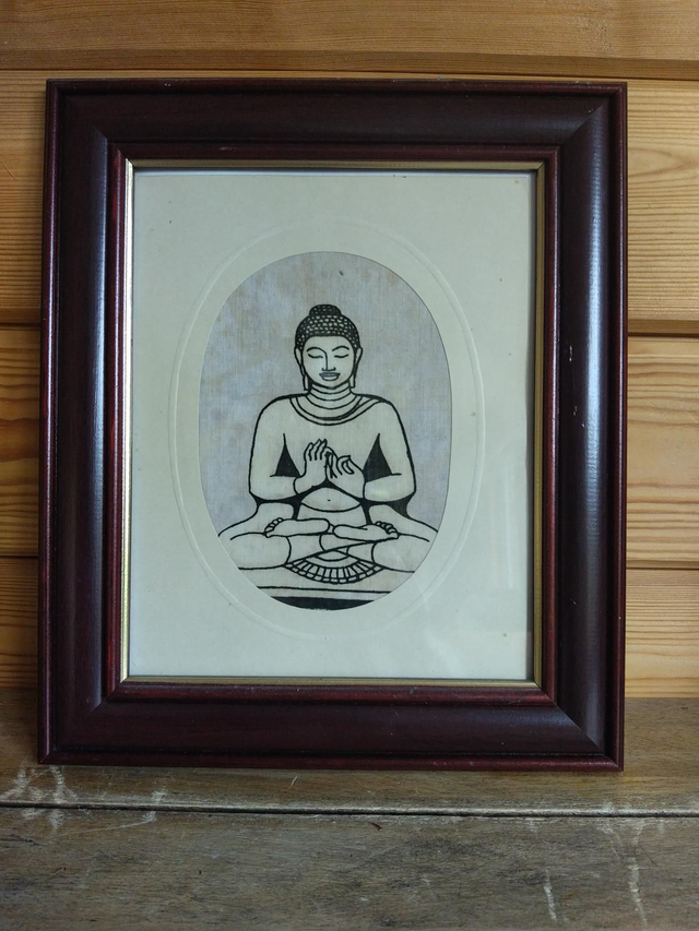 Framed ink drawing of Buddha