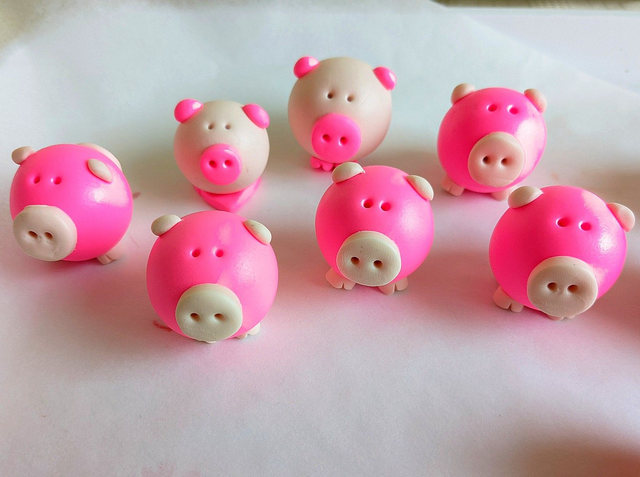 Bright neon pink piglet