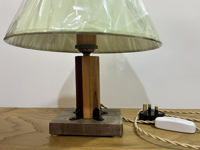 Retro-style bedside lamp made of four types of wood.