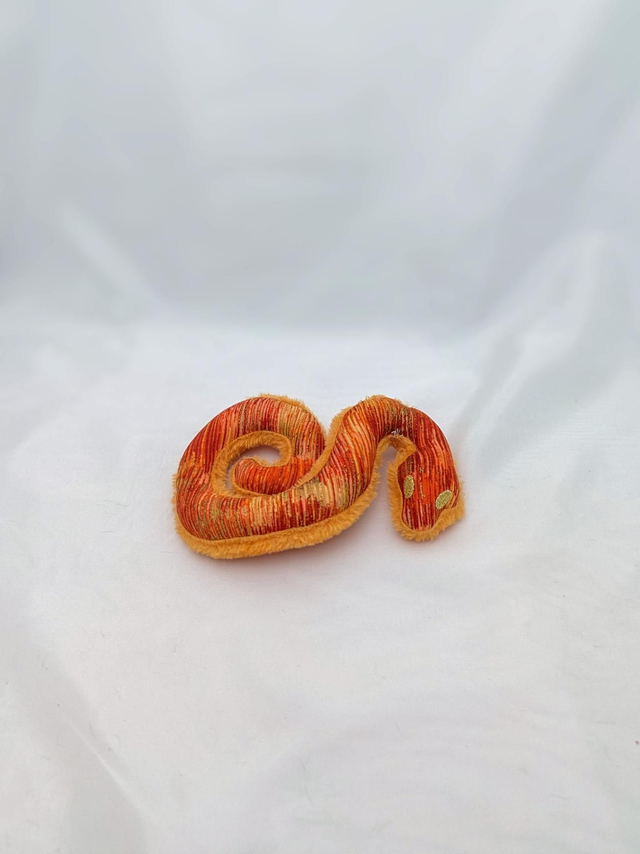 Serpent peluche orange
